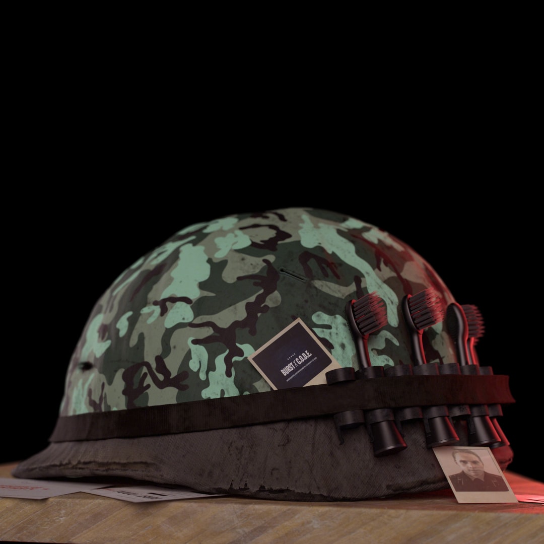 A camouflage helmet sits against a black background.
