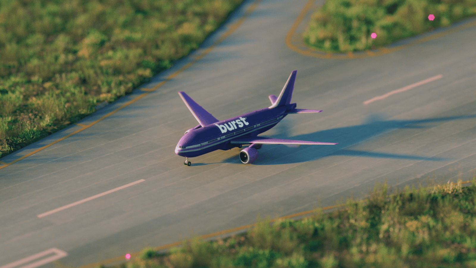 A purple Burst airplane taxis along a miniature runway.