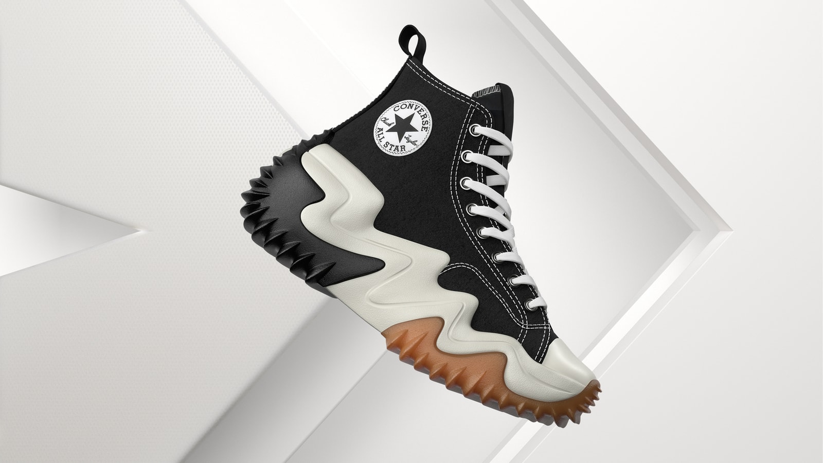Converse Run Star Motion sneaker against sculpted white forms.