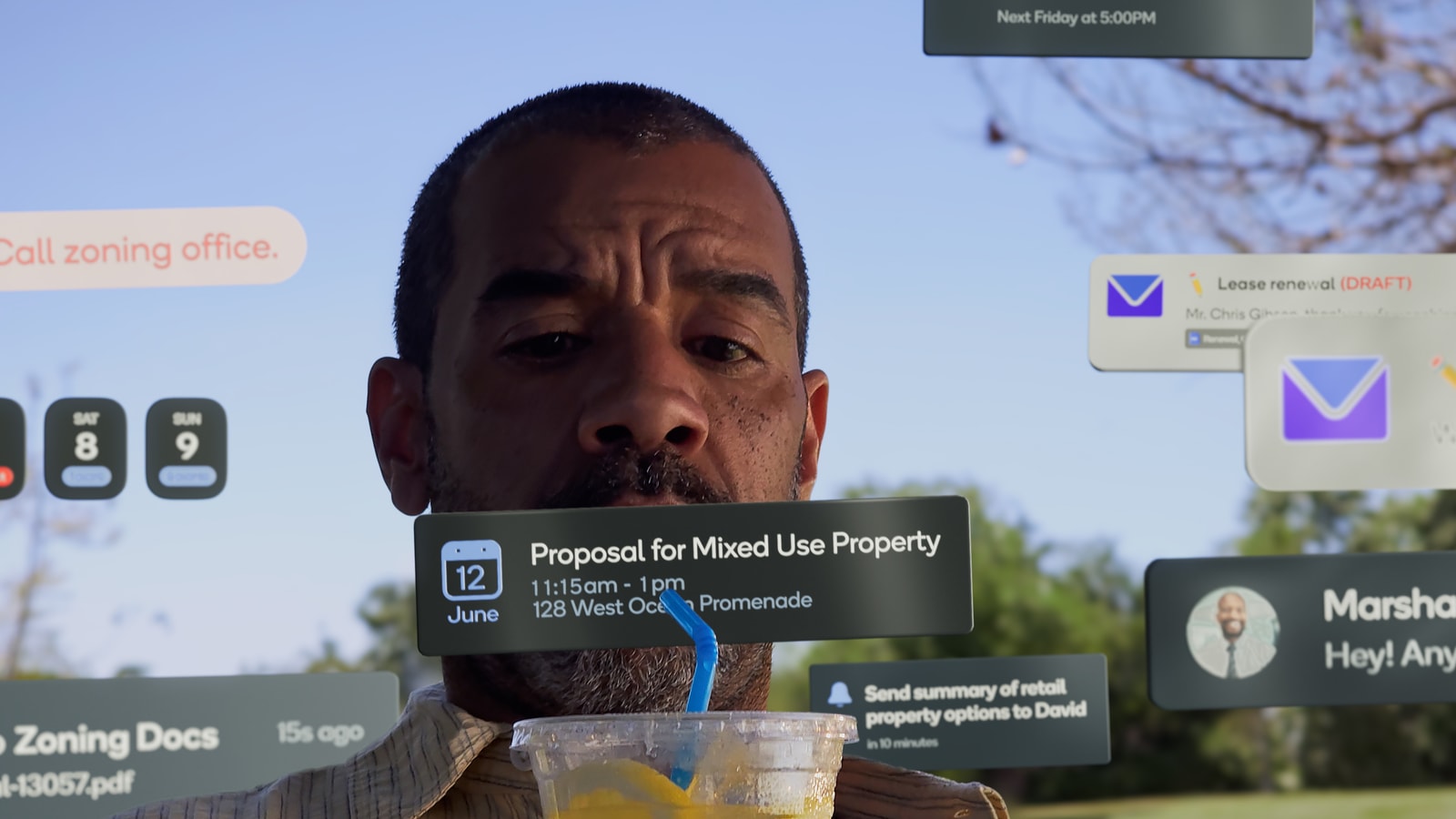 Notifications float in front of a man outdoors.