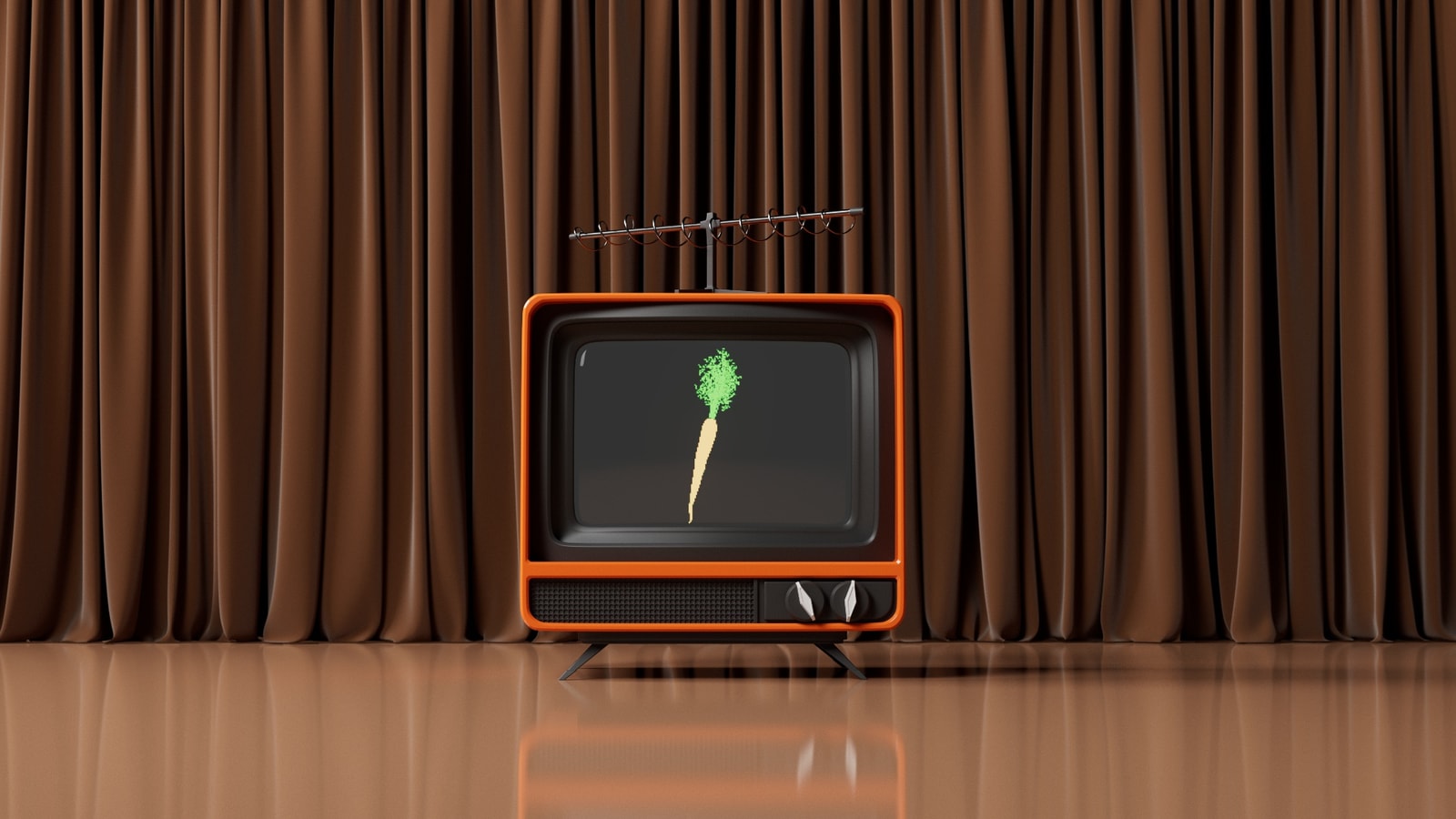 A television with a carrot on screen in front of theater curtains.