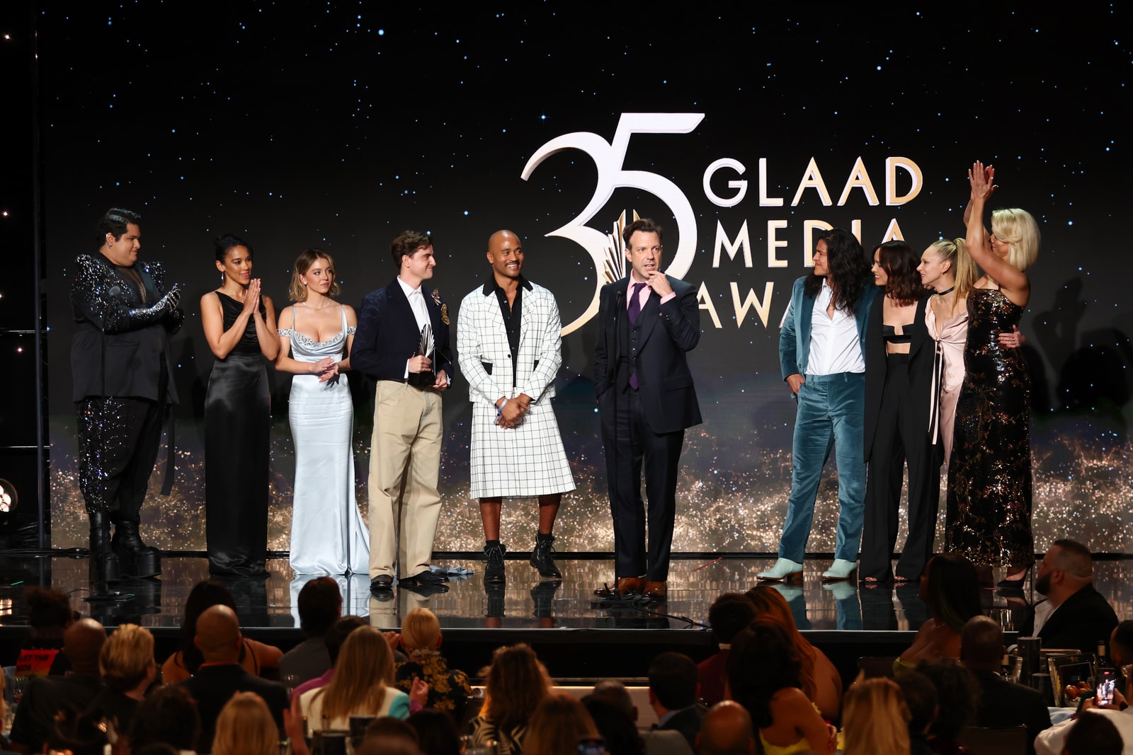 A group stands on stage beneath the 35th GLAAD Media Awards logo.