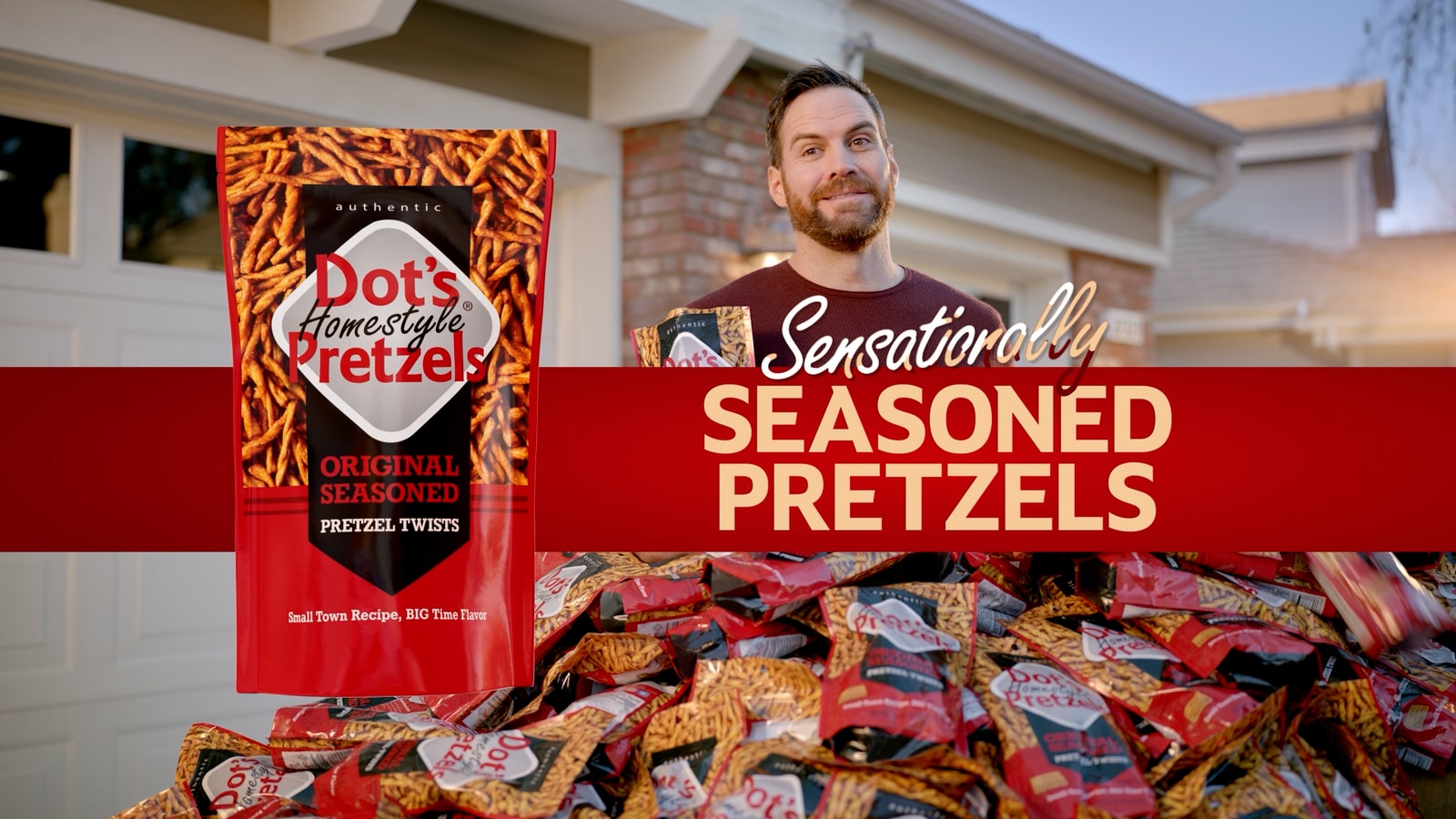 Dot’s Homestyle Pretzels end card over a pile of pretzel bags.